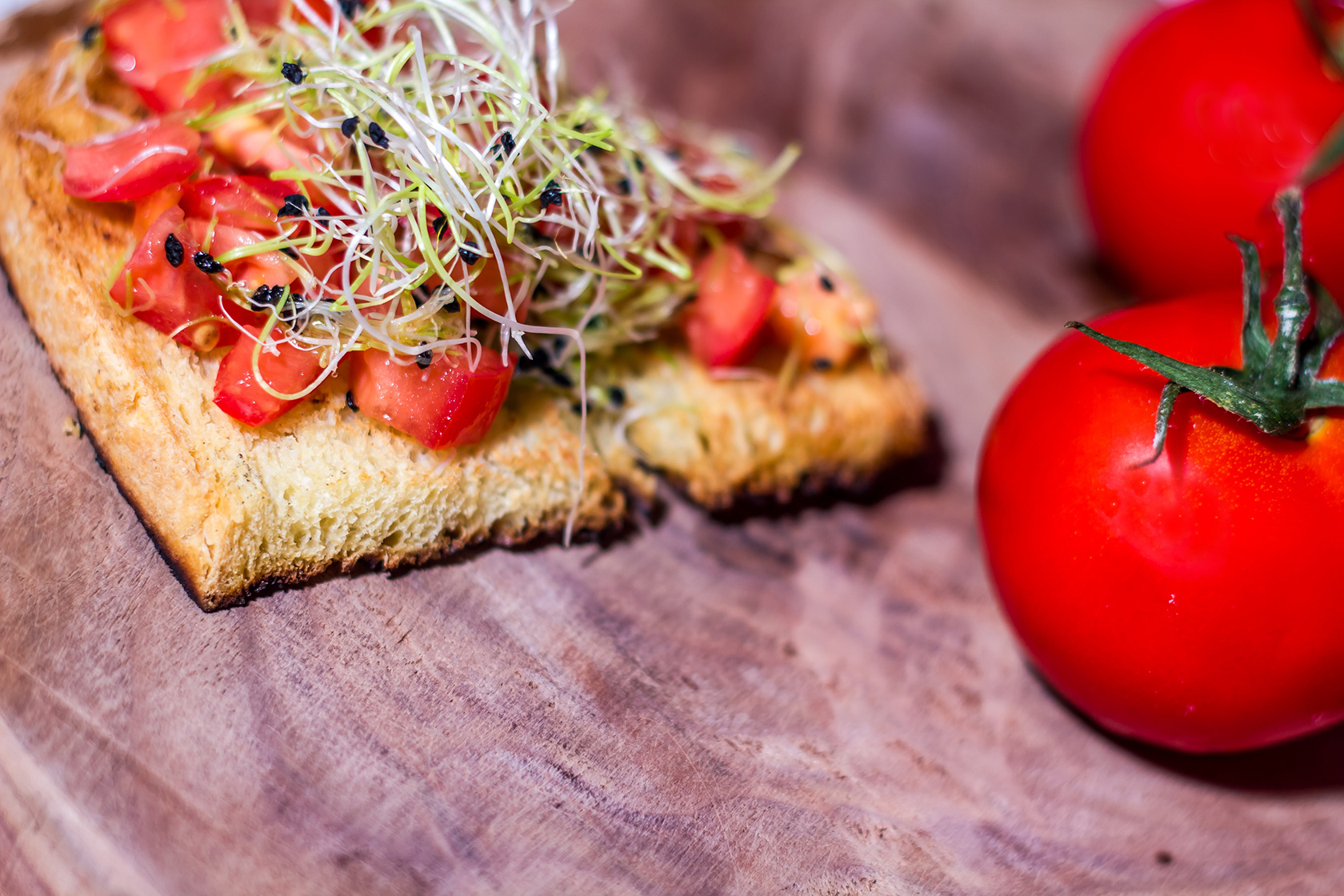 Image of Bruschetta with nasturtium flowers and tomatoes